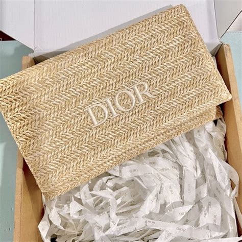 dior raffia clutch bag.